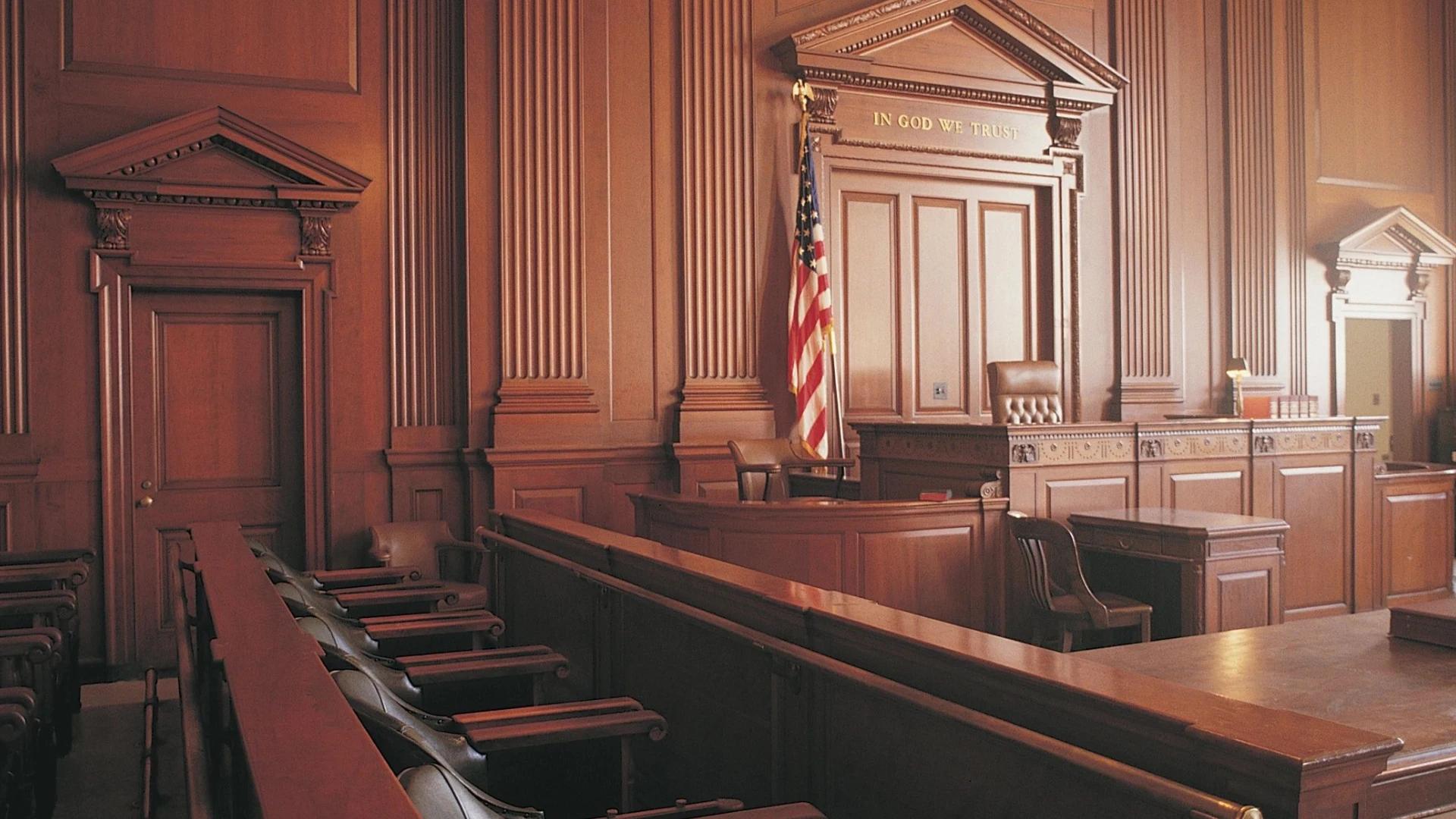 American courtroom, wooden paneling, judge's bench.