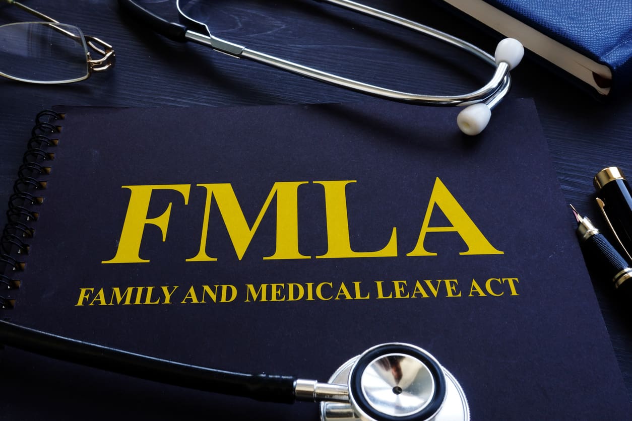 FMLA family and medical leave act and stethoscope.